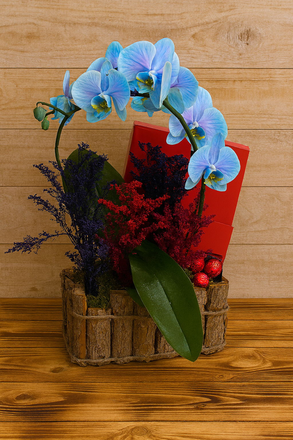 “Orquídea azul y bombones: el detalle perfecto para enamorar.”